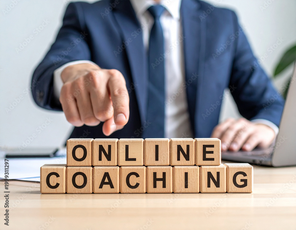 Obraz premium Online Coaching - Geschäftsmann zeigt auf den Text 