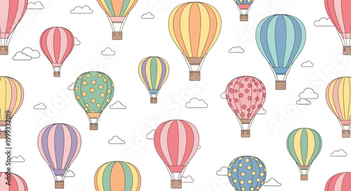 Colorful hot air balloons float gently amidst fluffy clouds in a clear sky.
