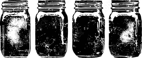 Vintage empty glass jars with textured, distressed black and white grunge effect set