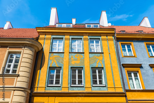 Mermaid of Warsaw, Poland syrenka warszawska symbol coat of arms ornate carving on building exterior of myth legend in old town market square