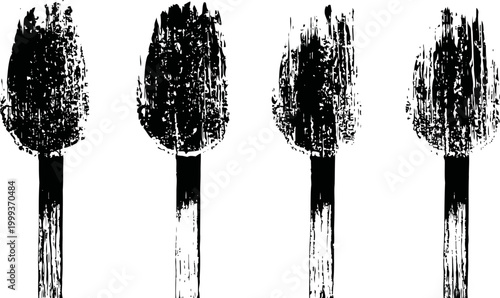 vintage wooden matchsticks with textured burnt tips set isolated on white background
