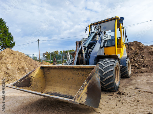 Tableau sur toile skid steer loader machine for earthmoving on construction site
