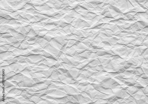 Crumpled white paper texture background with wrinkles and creases