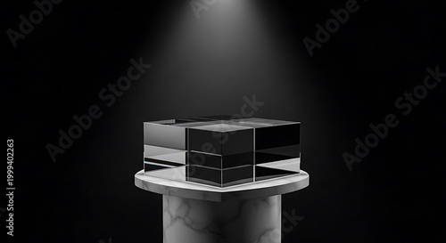 A sleek black cube-shaped object sits atop a marble pedestal under a spotlight in a dark room