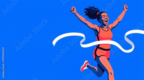 Female sprinter bursts through finish line ribbon with arms raised  