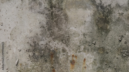 Weathered and stained old concrete wall texture with rust spots