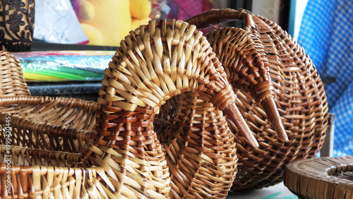 Decorated handmade items made of bamboo displayed in a handicraft shop