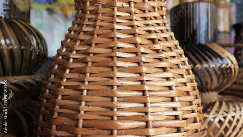 Decorated handmade items made of bamboo displayed in a handicraft shop