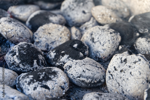 Hot BBQ Charcoal Briquettes Ready for Grilling with White Ash Texture