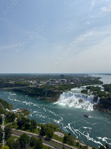 The American Falls and Bridal Veil Falls, the U.S. Customs and Border Protection – Rainbow Bridge Port of Entry, and the Prospect Point Observation Tower in Niagara Falls, Ontario, Canada.