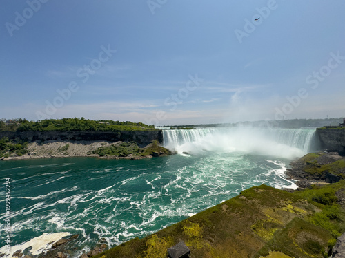 The Horseshoe Falls is the largest of the three waterfalls that collectively form Niagara Falls on the Niagara River along the Canada-United States border.