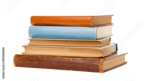 Fotografie Stacked vintage books with orange blue yellow, and brown covers