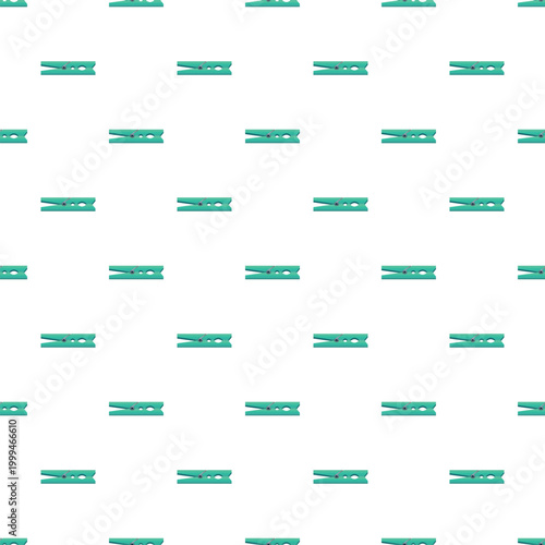 Repeating green clothes pegs creating a clean and organized household laundry background