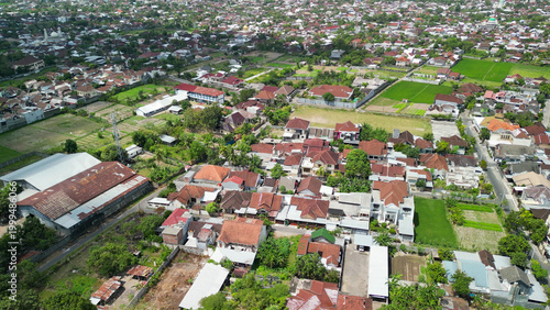 Foto Stunning overhead panorama of Mataram capital featuring Tembolok Gate highway in