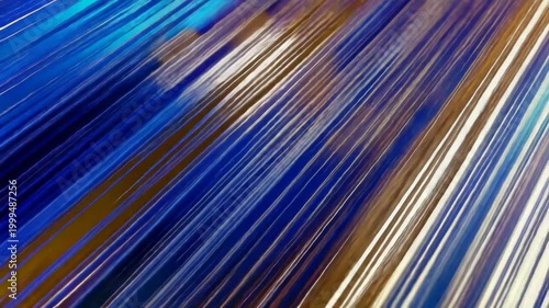 Abstract lines of blue and gold create a dynamic, flowing pattern. This vibrant background suggests digital data or energy movement.