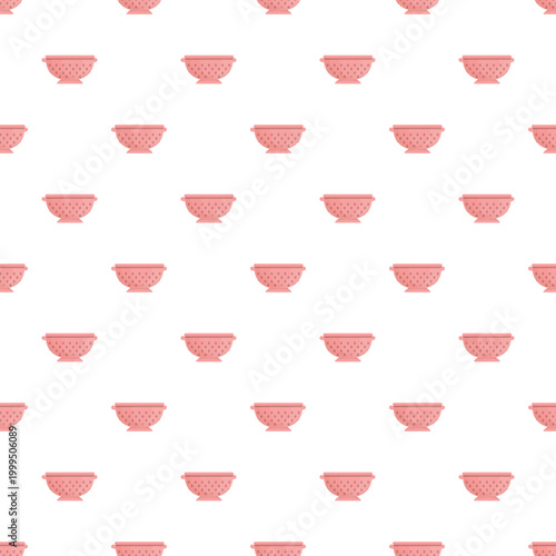 Pink colanders creating a fun repeating pattern for kitchen, cooking, or food preparation themes
