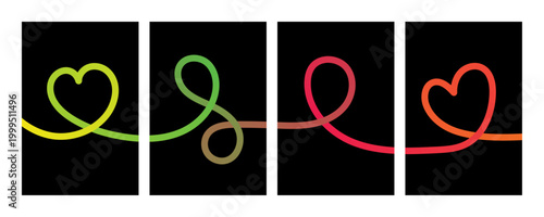 Abstract colorful light painting hearts and swirls on black background