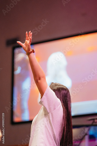 Worship leader worshiping, church