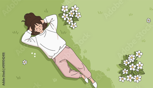 Woman relaxing on grass with flowers top view calm lifestyle