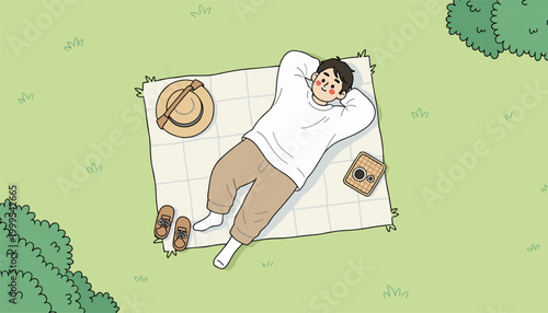 Man relaxing on blanket in park peaceful outdoor scene