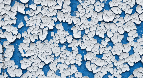 Close-up of peeling white paint on blue surface