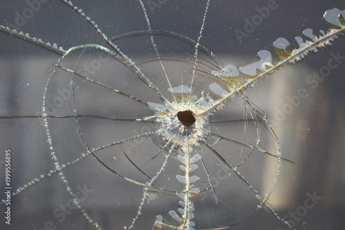Broken glass from a gun bullet
