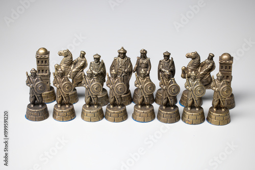 Bronze chess pieces depicting historical mamluk warriors
