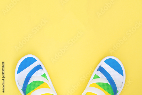 Vibrant summer vibes mobile wallpaper with stylish beach sandals.