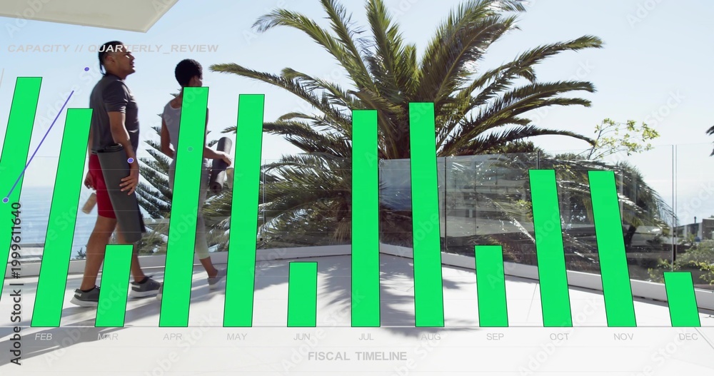 Obraz premium Walking fit couple crossing sea terrace with glass rail, palm tree, green chart overlay, copy space