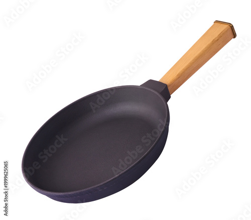 Fotografie Levitating small cast iron frying pan with a wooden handle isolated on a white background