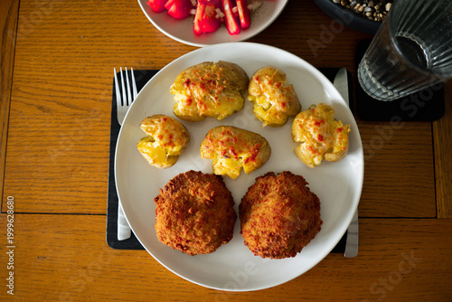Potatoes had a glow-up! Smashed, cheesed & slightly crispy — just like me on a Friday night. Breaded cutlets showing off too.