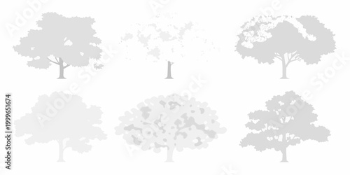 set of seven gray tone tree silhouettes on white background