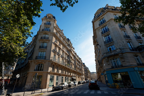 Fotografie The facade of typical Parisian buildings, done in the typical elegant Haussmann or Haussmannian 19th-century style