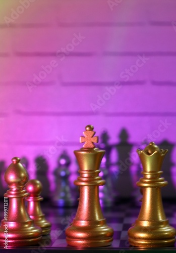 chess pieces on the chess board artistic background game playing competition art photo vertical orientation