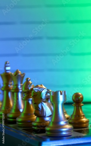 chess pieces on the chess board artistic background game playing competition art photo vertical orientation