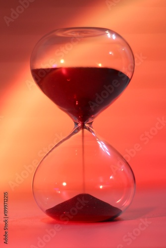 Hourglass as symbol of passing time concept photo vertical orientation art 