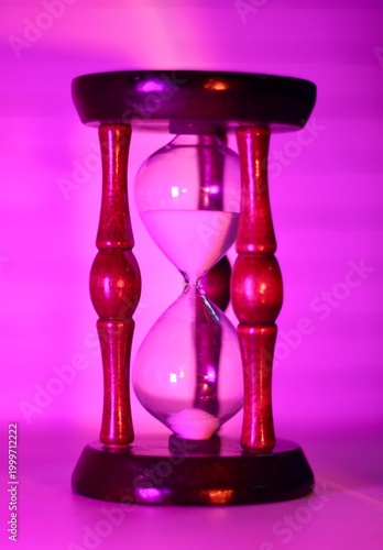 Hourglass as symbol of passing time concept photo vertical orientation art 