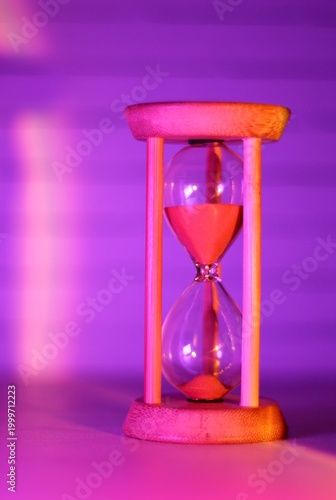 Hourglass as symbol of passing time concept photo vertical orientation art 