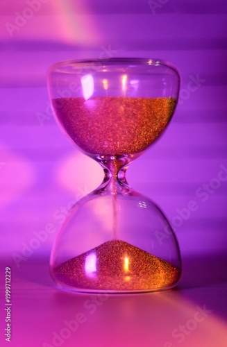 Hourglass as symbol of passing time concept photo vertical orientation art 