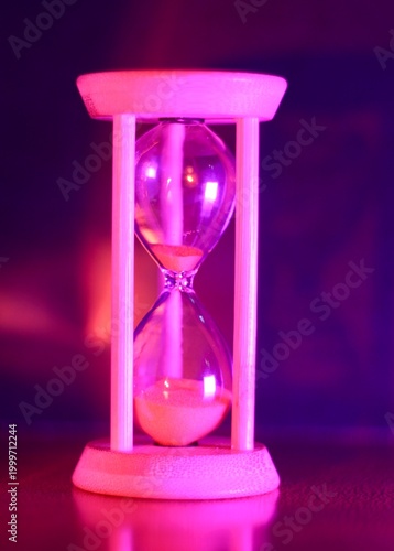Hourglass as symbol of passing time concept photo vertical orientation art 