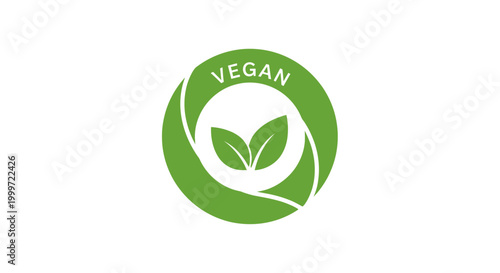 Vegan logo with green leaf design and text on white background