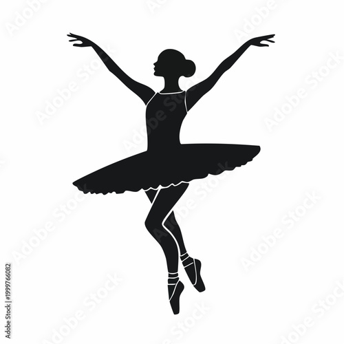 Silhouette of a Ballerina in a Tutu Performing a Dance Pose