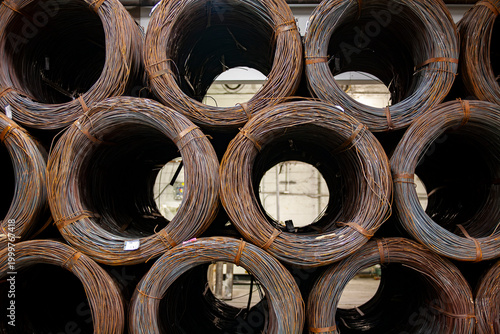 spools of wire stacked in shipping yard