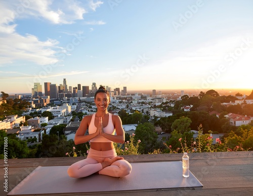 Serene woman practices yoga on a mat outdoors, overlooking a vibrant city skyline at sunset, embracing wellness and mindfulness amidst urban beauty