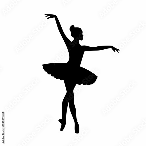Silhouette of a ballerina in a tutu performing a ballet pose