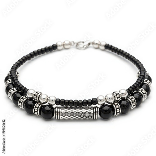 Black beaded bracelet with silver accents and central tube jewelry
