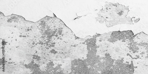 A rough gray grunge wall background featuring a dirty cement surface with a textured old paint pattern and a weathered stone material design