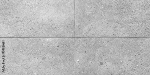 A rough grey cement surface with a grunge stone texture creates a weathered concrete wall background ideal for modern architecture and construction material backdrops