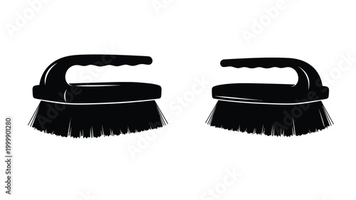 Two black shoe brushes presented on a white background silhouette