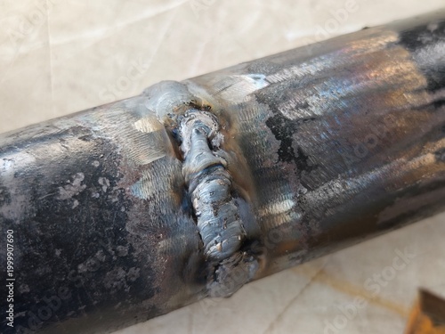 Принти на полотні Close-up of pipe cover pass weld with visible welding defect on butt joint
